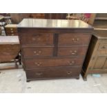 A GEORGE III OAK CHEST OF DRAWERS ON BRACKET FEET, 41" WIDE, THE TOP FOUR DRAWERS CONVERTED TO TWO