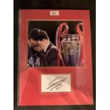 A PICTURE OF JURGEN KLOPP WITH HIS AUTOGRAPH IN A MOUNT COMPLETE WITH CERTIFICATE OF AUTHENTICITY