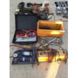 AN ASSORTMENT OF TOOLS TO INCLUDE A BATTERY CHARGER AND JUMP LEADS ETC