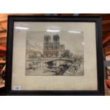 A FRAMED AND SIGNED PRINT OF A CATHEDRAL BESIDE A CANAL