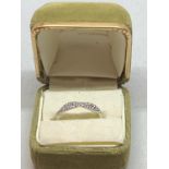A WHITE METAL CLEAR STONE TWISTED RING SIZE P1/2 WEIGHT 2,49g WITH PRESENTATION BOX