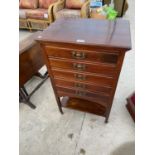 AN EARLY 20TH CENTURY MAHOGANY MUSIC CABINET WITH FIVE FALL FRONT DRAWERS