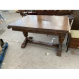 AN OAK DRAW LEAF DINING TABLE ON PINEAPPLE BALUSTER SUPPORTS