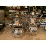 FOUR PIECES OF SILVER PLATED COFFEE WARE