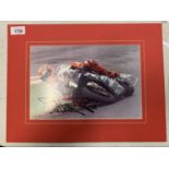 A CARD MOUNTED AND SIGNED COLOUR PRINT OF CARL FOGGARTY COMPLETE WITH CERTIFICATE OF AUTHENTICITY