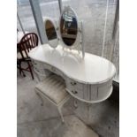 A MODERN CREAM AND GILT KIDNEY SHAPED DRESSING TABLE WITH TRIPLE MIRROR AND STOOL