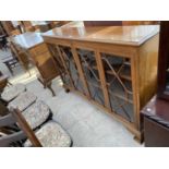 A MAHOGANY CABINET WITH FOUR GLAZED PANEL DOORS