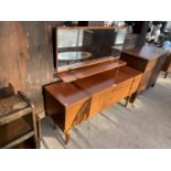 A RETRO TEAK EFFECT DRESSING TABLE, 53" WIDE