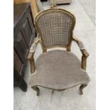 A 19TH CENTURY GILT WOOD ARMCHAIR WITH SPLIT CANE BACK