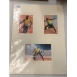 THREE MOUNTED COLOURED PHOTOGRAPHS, ONE SIGNED, OF JAMAICAN RECORD HOLDER USAIN BOLT COMPLETE WITH