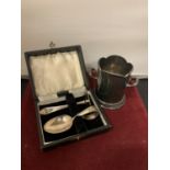 A BOXED HALLMARKED SILVER VINTAGE FIRST FEEDING SET AND A SILVER TWIN HANDLED CUP