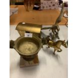 THREE ITEMS OF BRASSWARE TO INCLUDE AN URN, A BIRD AND A GYPSY CARAVAN WITH HORSE