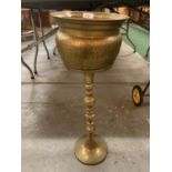 A VINTAGE BRASS PLANT STAND AND PLANT POT