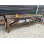 AN 11FT SOLID WOODEN WORK BENCH WITH SHELF UNDERNEATH TO INCLUDE A POWER SHARPENER TOOL