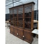 A REPRODUX BY BEVAN FUNNELL MAHOGANY GEORGE III STYLE THREE DOOR GLAZED BOOKCASE ON BASE - 80" WIDE,
