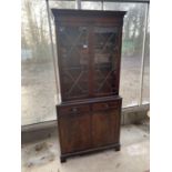 A REPRODUCTION MAHOGANY ASTRAGAL GLAZED BOOKCASE WITH CUPBOARDS TO THE BASE, DENTIL CORNICE, 33"