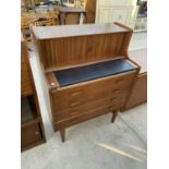 A WELTERS OF WYCOMBE RETRO TEAK BUREAU WITH TWO ROLL OUT DOORS AND FOUR DRAWERS