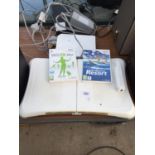 A WII FIT BOARD WITH TWO GAMES AND CONTROLLER TOGETHER WITH NINTENDO WII