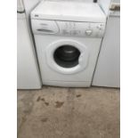 A WHITE HOTPOINT FIRST EDITION WASHING MACHINE BELIEVED IN WORKING ORDER BUT NO WARRANTY
