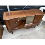 A SHINY WALNUT HUBBINET SIDEBOARD, WITH TWO GLASS CENTRE SECTION DRAWERS