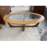 AN OVAL G-PLAN STYLE COFFEE TABLE WITH INSET GLASS TOP, 42x21"