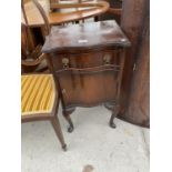 A MAHOGANY BEDSIDE LOCKER ON CABRIOLE LEGS