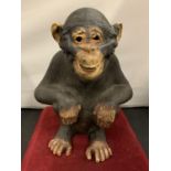 A MOVING BATTERY POWERED CHIMPANZEE (A/F)