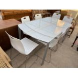 A MODERN OPAQUE GLASS TOPPED DINING TABLE WITH SEVEN WHITE DINING CHAIRS ON CHROME SUPPORTS