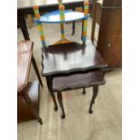 A NEST OF TWO MAHOGANY TABLES AND A PLAYROOM CORNER SHELF