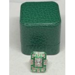 A LARGE RECTANGULAR ART DECO STYLE DRESS RING WITH GREEN AND CLEAR STONES SIZE N 1/2 WEIGHT 12.14G