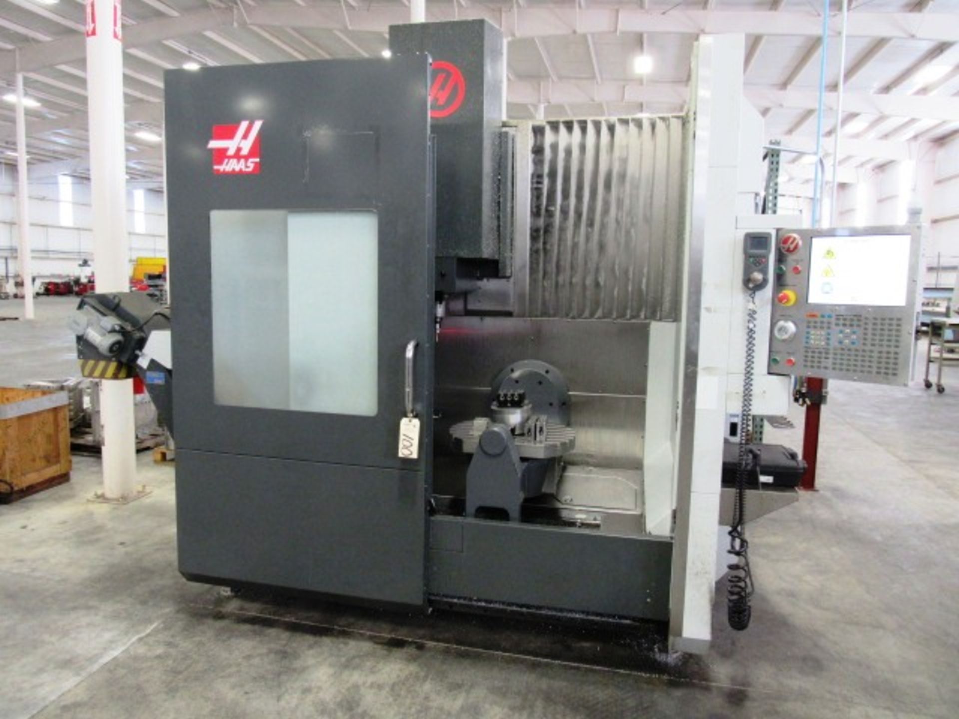 Haas UMC750 5-Axis CNC Vertical Machining Center with 19.7'' Diameter Rotary Trunnion Table, #40