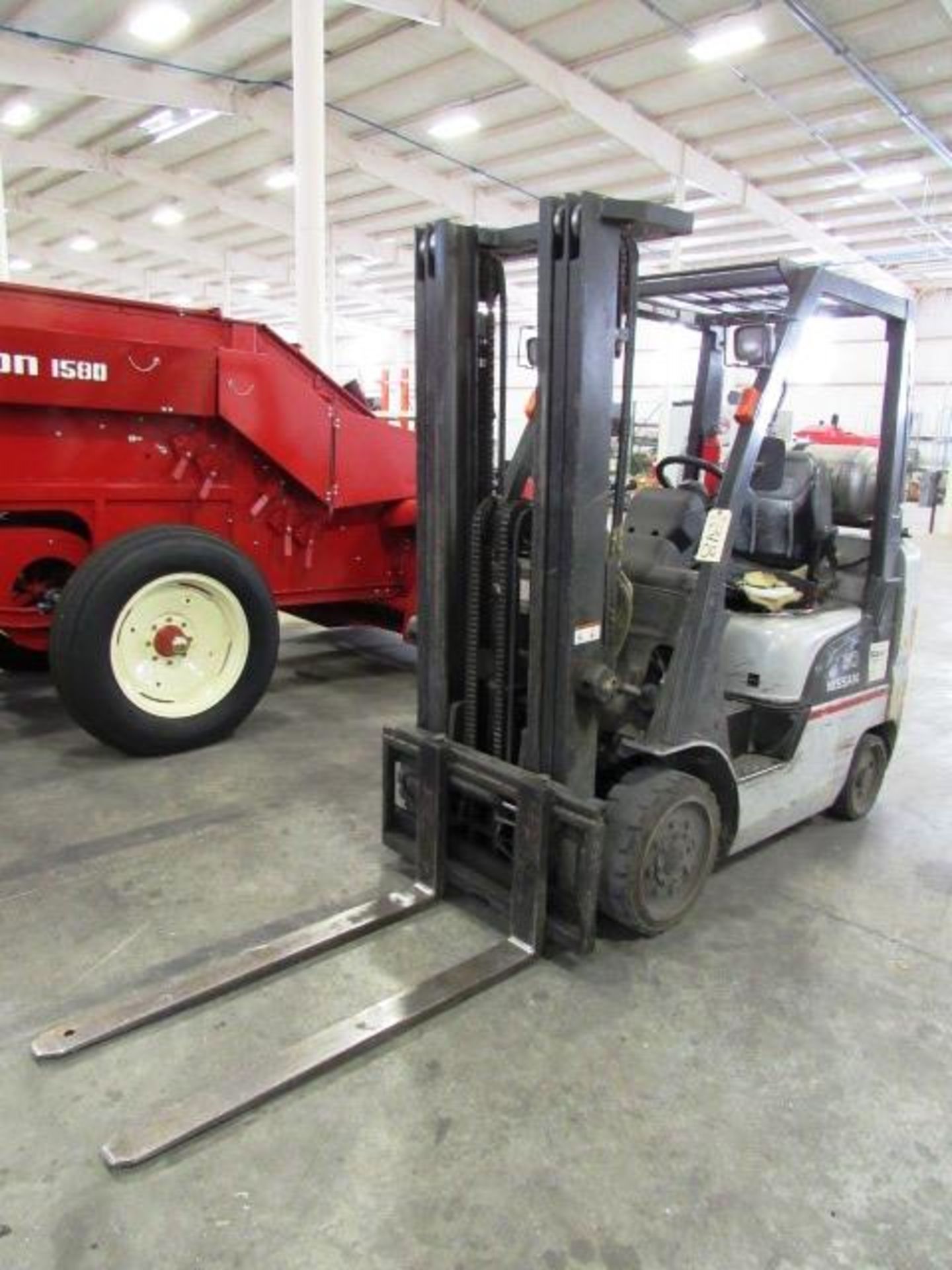 Nissan 50 4,400lb Capacity Propane Forklift with (4) Hard Tires, 3-Stage Mast with Side Shift,