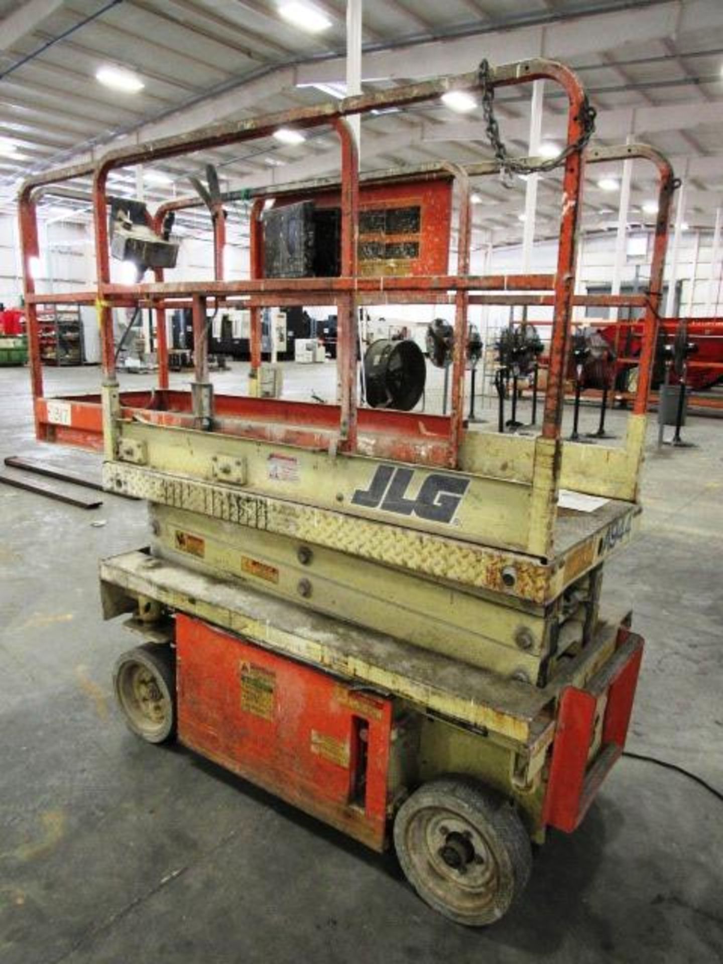 JLG Model A944 5,000lb Capacity Electric Manlift with Extendable Deck, Operators Control, 16' Lift