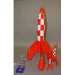 3 unboxed Moulinsart resin Moon Rocket models from their Herge TinTin 'Collection Images
