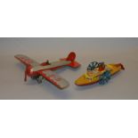 An unboxed vintage Mettoy tinplate Monoplane 'G-EOBT' in silver and red with fixed key, G/G+ overall