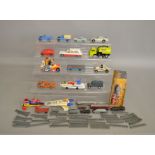 A carded Dinky Toys 361 Missile Firing War Chariot, sealed on P card, together with 15 unboxed