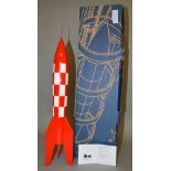 A boxed Moulinsart resin Moon Rocket model from their Herge TinTin range. When assembled, this