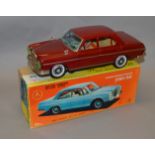 A boxed Ichiko (Japan) tinplate battery operated Mercedes Benz 250SE model with 'Mystery Action'.