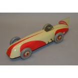 An unboxed tinplate Chad Valley streamlined Racing Car model, approximately 29cm long. The model has