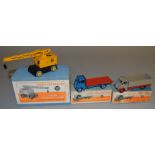 3 boxed Dinky Toys; a 512 Guy Flat Truck with some repainting in an original box, a  517 Coles