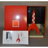 A boxed Moulinsart resin Moon Rocket model from their Herge TinTin range,,Catalogue No. 46972 'Fusee