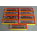 OO Gauge. 9 boxed Hornby BR unlined crimson Suburban Coaches of various types including five Gresley