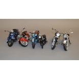 A group of unboxed Motorcycle models by Danbury Mint, Franklin Mint and others in various scales