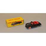 A boxed Dinky Toys 106 Austin Atlantic Convertible, black body with red hubs and interior, appears