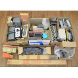 OO Gauge. A quantity of unboxed Railway Accessories including plastic buildings, various sections of