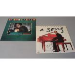 Neil Sedaka 2 signed LPs - "A Song" signed to cover in black pen and "In the Pocket" also signed