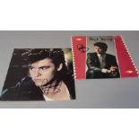 Paul Young 2 signed LPs - No Parlez signed by Paul Young to cover in black pen and The Secret of