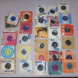 7 inch singles including Buddy Holly on Coral triangular and round centres, Eddie Cochran, Billy