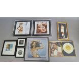 Closed record shop framed pictures including Ultimate Kylie CD DVD advert, Giving you up advertising