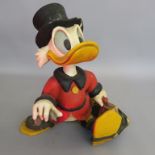 Walt Disney Scrooge McDuck statue ex shop display with cane missing measuring 21 inches tall. Disney